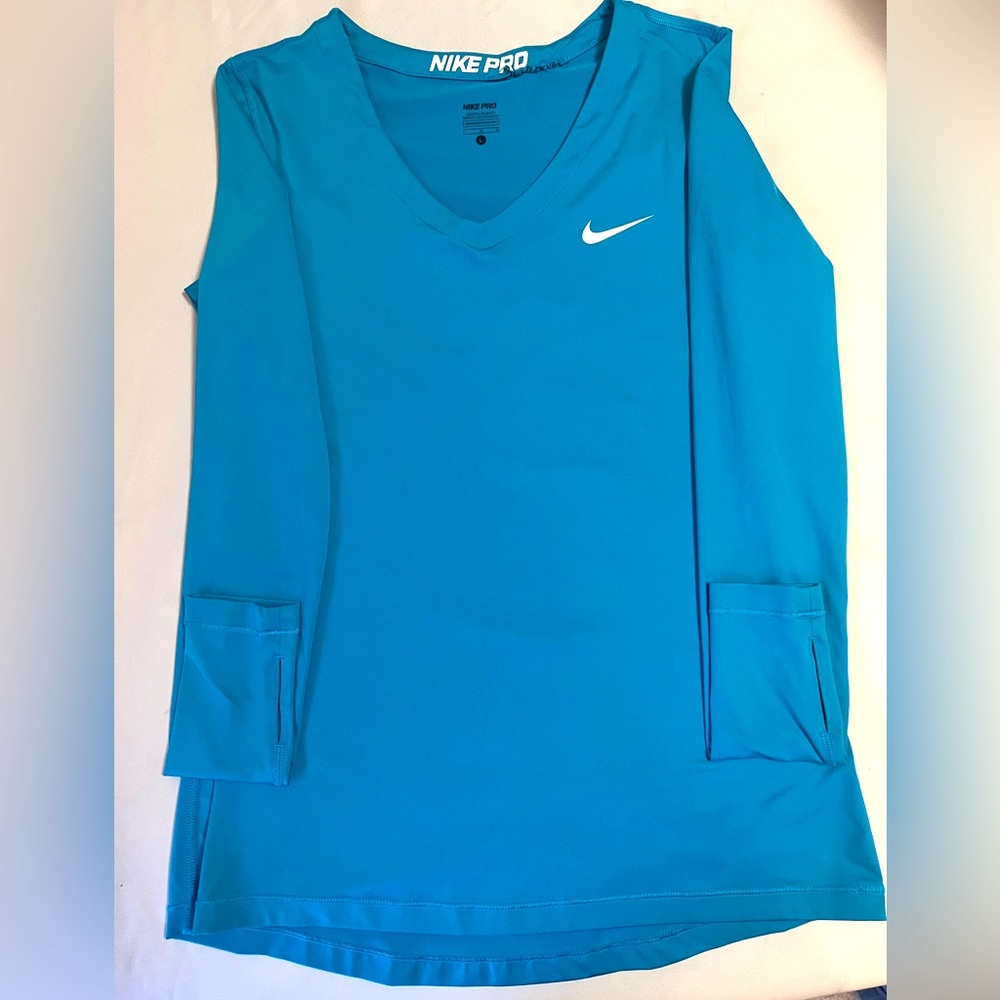 Nike pro dri-fit size large, women’s long sleeve. With thumb holes!
